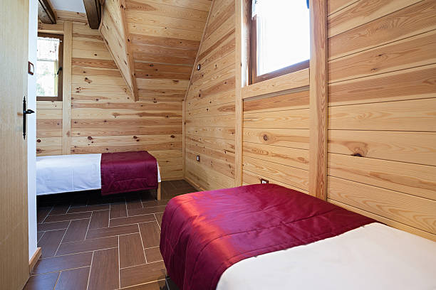 istock Bedroom in modern style log house 607919716