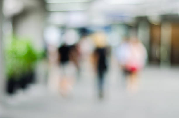 istock people in motion blur at the skytrain station 607919736