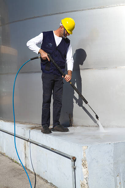 istock electrician and general worker washing  the floor 607920276