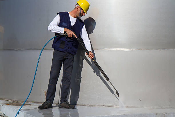istock electrician and general worker washing  the floor 607920994