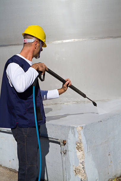 istock electrician and general worker washing  the floor 607921738