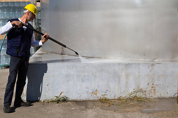 istock electrician and general worker washing  the floor 607922066