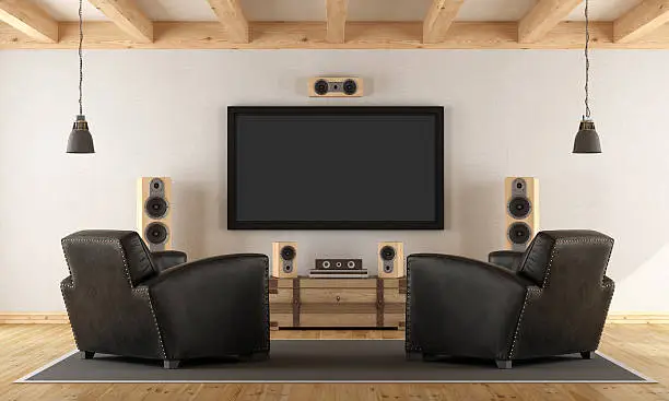 Photo of Home cinema system with vintage furniture