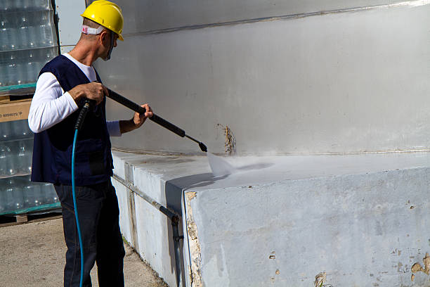 istock electrician and general worker washing  the floor 607923090