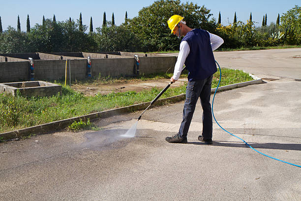 istock electrician and general worker washing  the floor 607923504