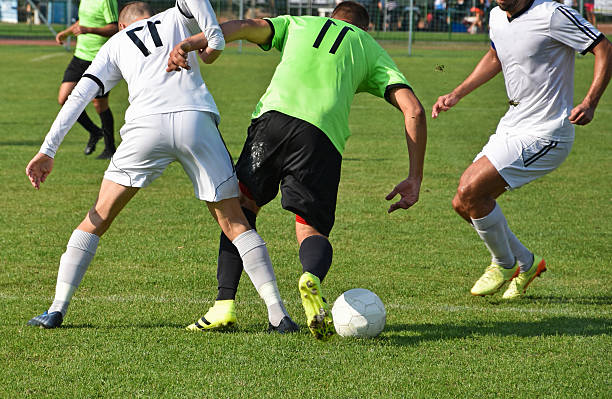 istock Soccer players in action 607923618