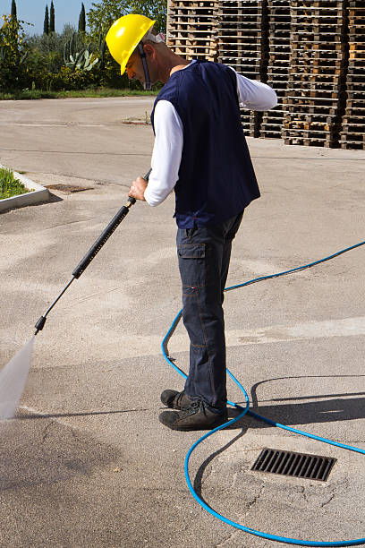istock electrician and general worker washing  the floor 607924006