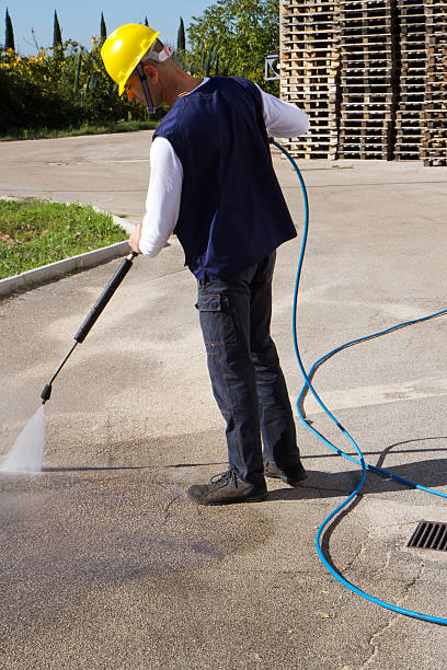 istock electrician and general worker washing  the floor 607924118