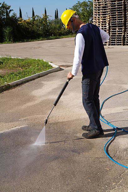 istock electrician and general worker washing  the floor 607924236