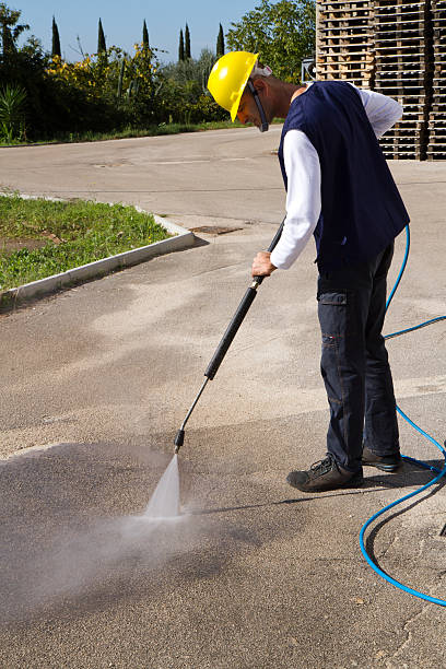 istock electrician and general worker washing  the floor 607924332