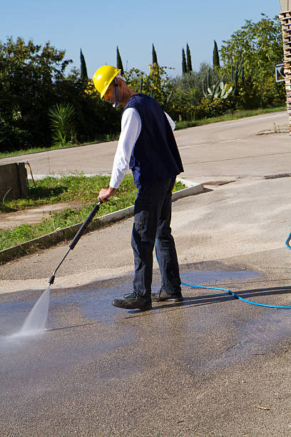 istock electrician and general worker washing  the floor 607925246