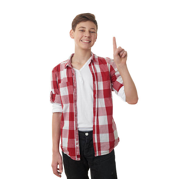 istock Cute teenager boy over white isolated background 607925514