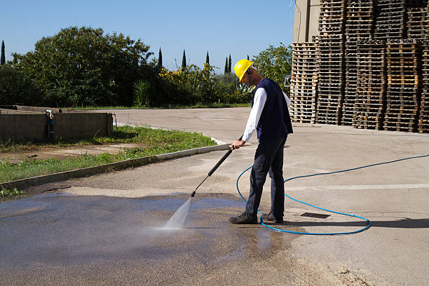 istock electrician and general worker washing  the floor 607925592