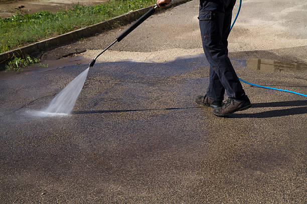 istock electrician and general worker washing  the floor 607925952
