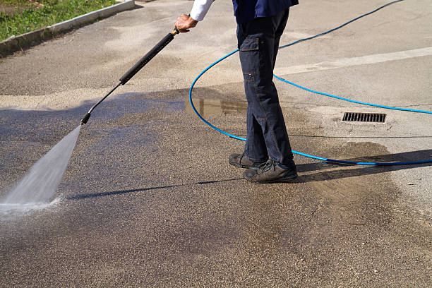 istock electrician and general worker washing  the floor 607926088