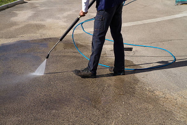 istock electrician and general worker washing  the floor 607926212