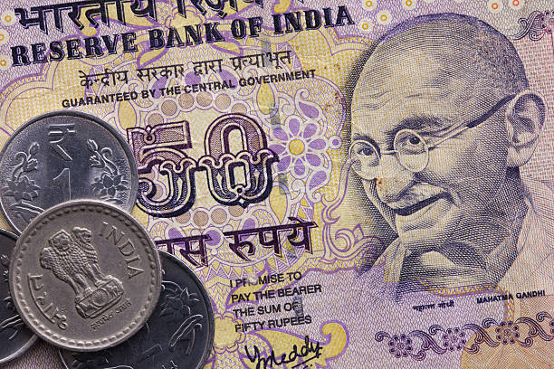 istock Different banknotes and coins  of Indian money 607926898