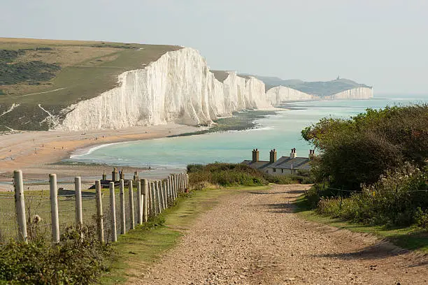 View towards the Seven Sisters chalk cliffs and Beachy Head from Seaford Head. East Sussex, England