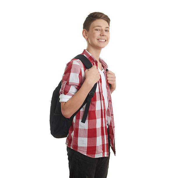 istock Cute teenager boy over white isolated background 607928304