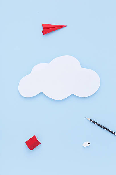 istock Paper cloud on the blue sky. Travellling concept. Flat lay. 607928466
