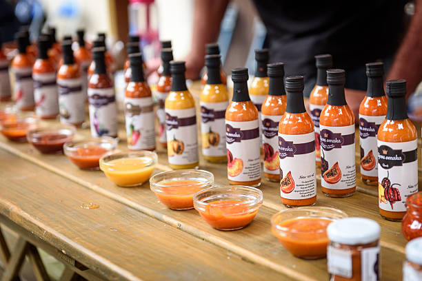 2nd Chili - Hot Pepper Festival Fair in Lepa Zoga. Ljubljana, Slovenia - September 17, 2016: 2nd Chili - Hot Pepper Festival Fair in Lepa Zoga. Different Hot Sauce makers present their products to the public. Fotrovi ciliji hot sauce. stuffing food photos stock pictures, royalty-free photos & images