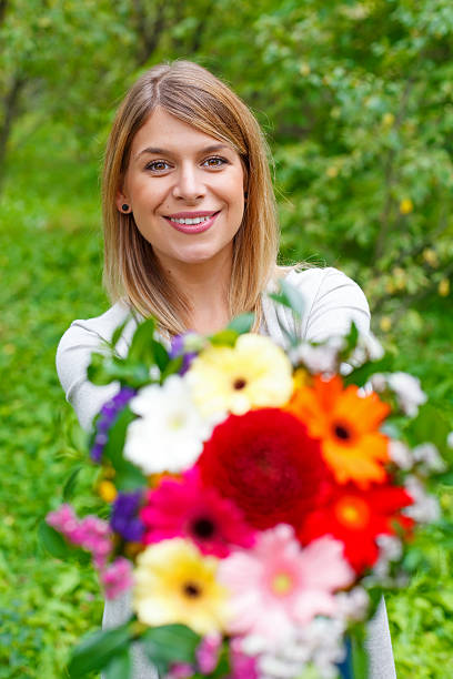 istock Smiling woman in love 607929274
