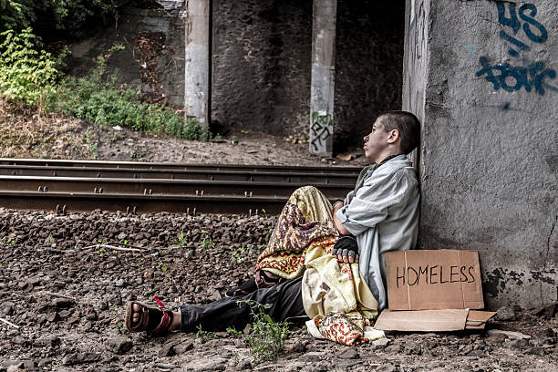 istock Poor homeless woman 607929332