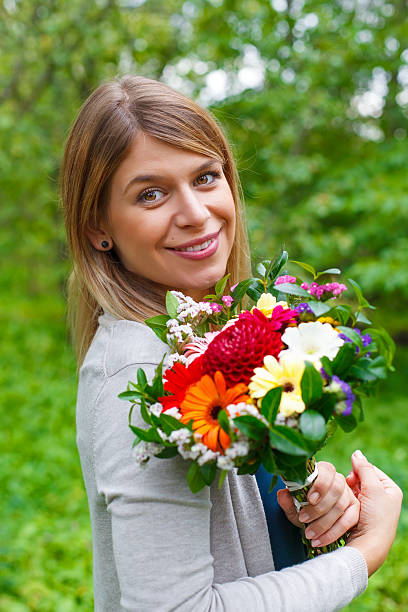 istock Smiling woman in love 607929396