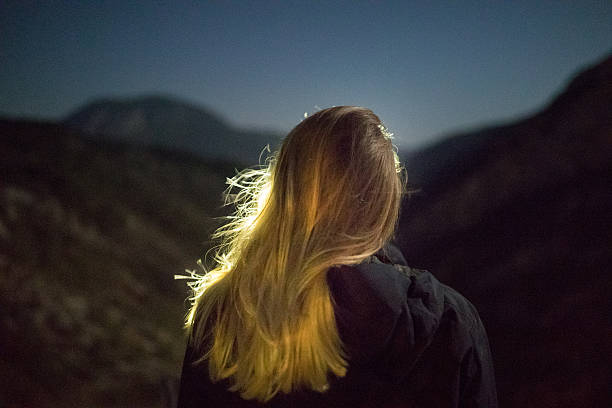 istock Girl and the hills 607930322