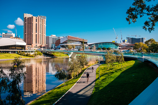 Adelaide, Australia - September 11, 2016: Foot bridge across the River Torrens in in Elder Park on a bright day