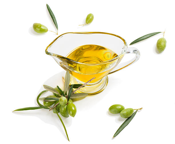 istock Olive oil and olive branch 607964042