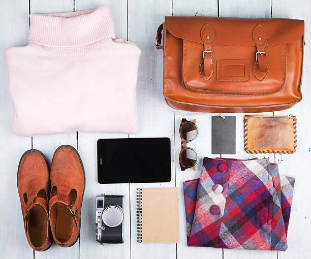 istock tablet pc, clothes, camera, shoes and bag 607968476