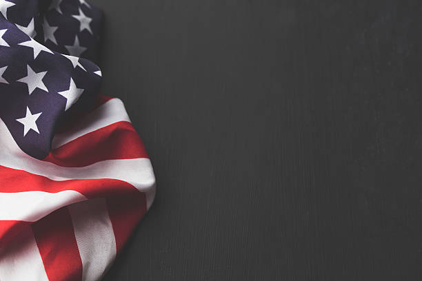 istock USA stars and stripes flag on a dark chalkboard background 607972084