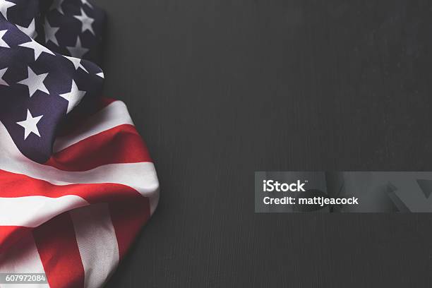 Usa Stars And Stripes Flag On A Dark Chalkboard Background Stock Photo - Download Image Now