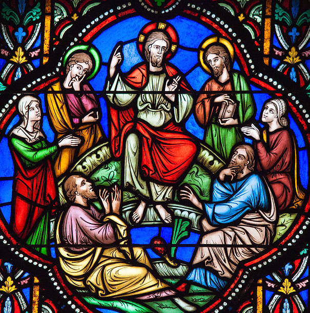 Sermon on the Mount Stained Glass Brussels, Belgium - July 26, 2012: Stained glass window depicting Jesus and the Sermon on the Mount in the cathedral of Brussels, Belgium preacher photos stock pictures, royalty-free photos & images