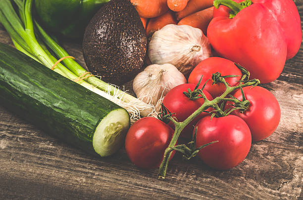 istock Delicious mixed vegetables on a oak wooden kitchen table 607974814