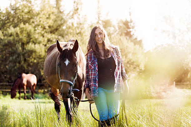 istock Woman with her horse 607976014