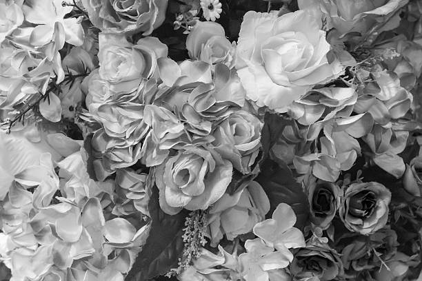 istock Beautiful multicolored artificial flowers background. flowers decor. 607977548