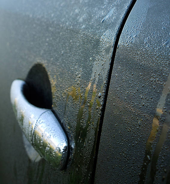 istock Condensate on door handle of car. 607977750
