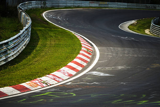 racetrack straight to the mountain with clear sky.