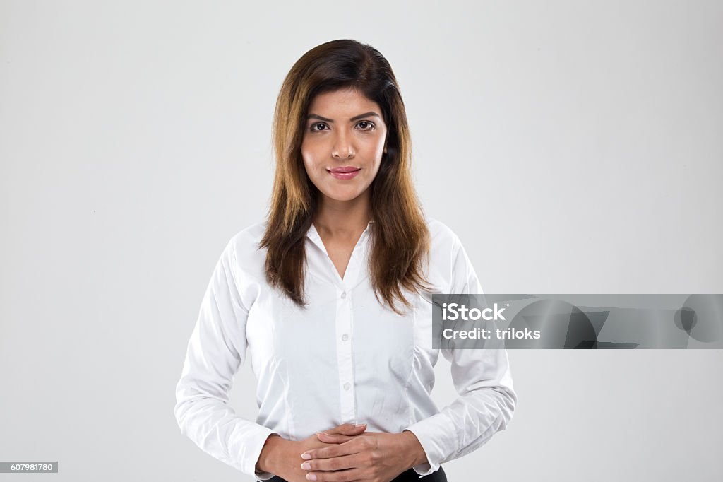 Portrait of a young businesswoman Portrait of a young businesswoman standing on isolated on white background. Women Stock Photo