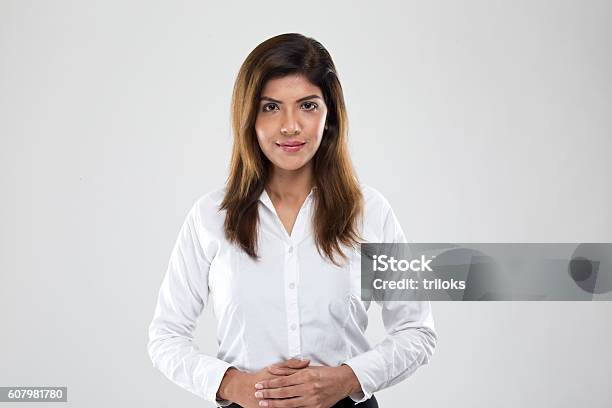 Portrait Of A Young Businesswoman Stock Photo - Download Image Now - Women, White Background, One Woman Only