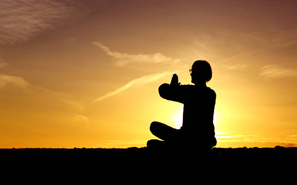 istock serenity and yoga practice at sunset 607988402