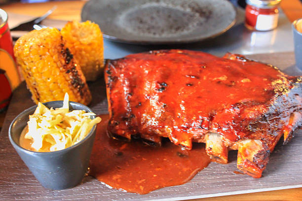 istock Bbq spareribs with corn and coleslaw 607989480