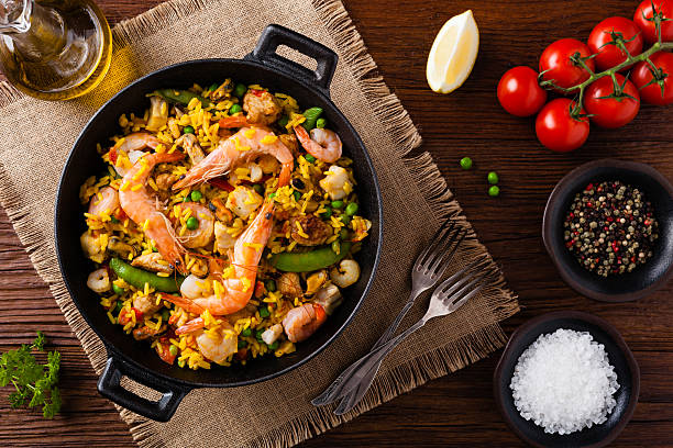 istock Traditional Spanish paella with seafood and chicken. 607991530