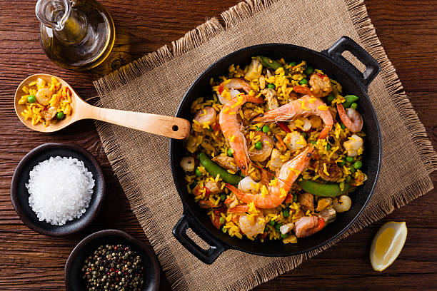 istock Traditional Spanish paella with seafood and chicken. 607991670
