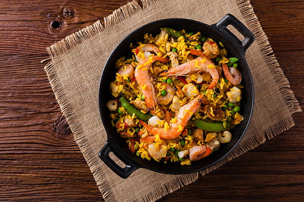 istock Traditional Spanish paella with seafood and chicken. 607991934