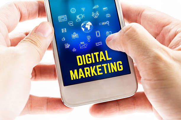 istock Close up Two hand holding mobile phone with Digital marketing 607992316
