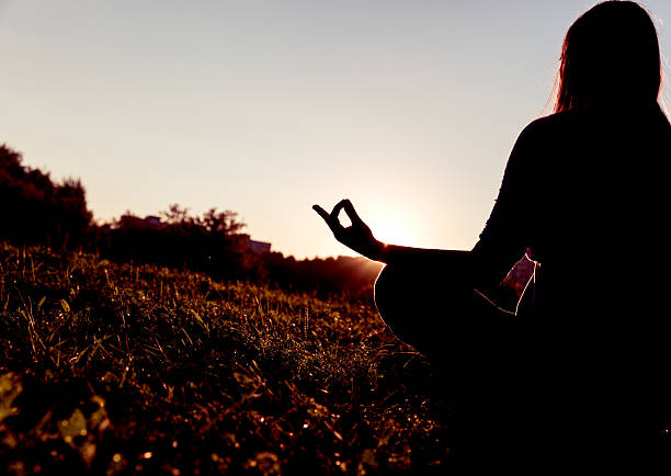 istock serenity and yoga practice at sunset 607993206