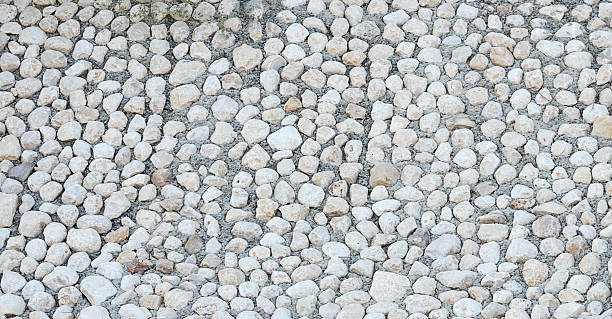 istock Background made a closeup of cobblestones pattern floor 607993614